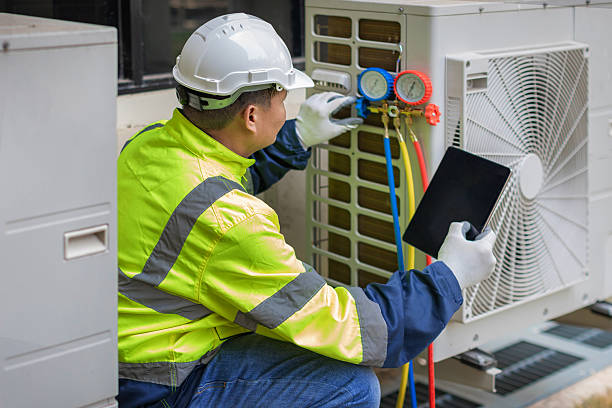 Professional Hvac Maintenance technician working in Pepperell, MA